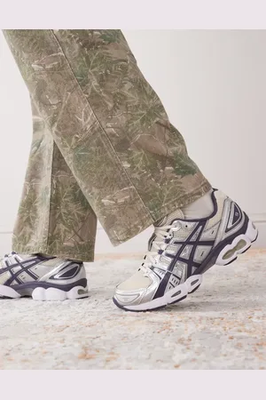 Asics Gel-Nimbus 9 trainers in oatmeal and indigo fog