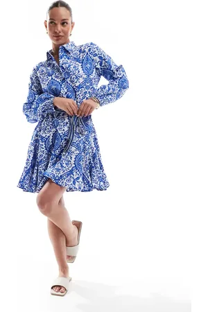 ONLY Dropped hem tie waist mini dress in tile print