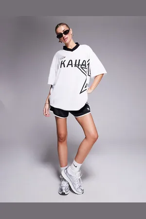 Kaiia Sport oversized star logo football jersey in and black