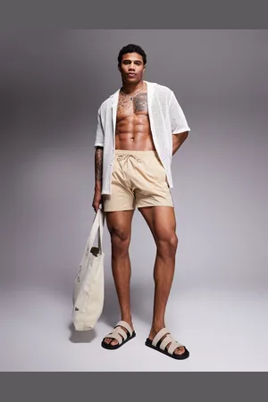 HUGO BOSS BOSS Iconic side stripe logo swim shorts in light beige
