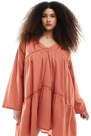 Esmée Exclusive tiered long sleeve mini beach dress in rust