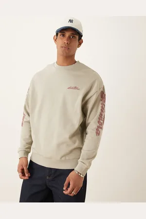 ASOS Oversized sweatshirt with text sleeve prints in stone