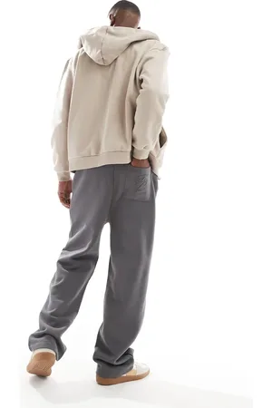 ASOS Premium wide leg joggers with high build print in charcoal