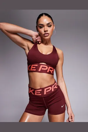 Nike Nike Pro Training Indy Dri-FIT Plunge light support sports bra in burgundy
