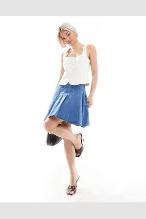 Pieces® Pleated mini denim skirt in light denim wash