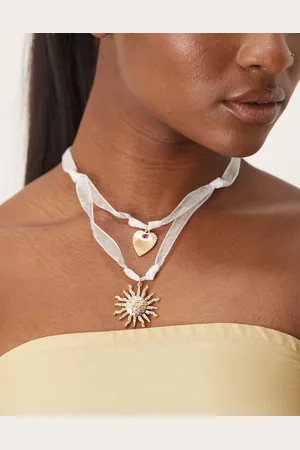 ASOS Ribbon necklace with sun charm in tone