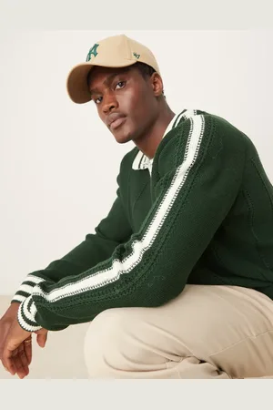 ASOS Relaxed ribbed knitted polo jumper with tipping and seam detail in dark