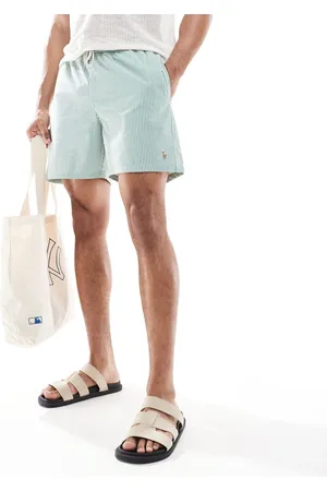 Ralph Lauren Traveler icon logo seersucker stripe swim shorts classic fit in mid