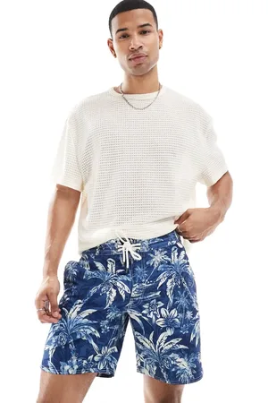 Ralph Lauren Icon logo palm island shadow print long swim shorts in mid