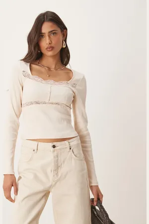 ASOS Ribbed long sleeve top with lace and button detail in cream