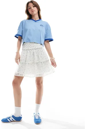 VERO MODA Smilla tiered mini skirt in blue ditsy floral
