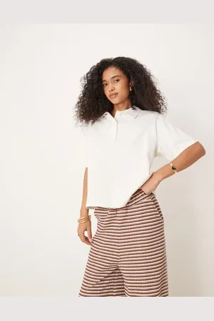 ASOS Boxy oversized polo top with shoulder pad in white
