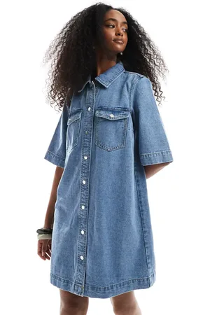 VERO MODA Oversized button front short sleeve denim dress in medium wash