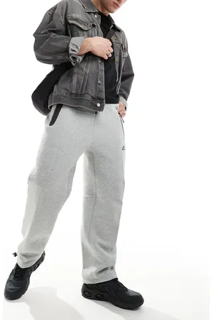 Nike Tech Fleece loose fit joggers with toggle in