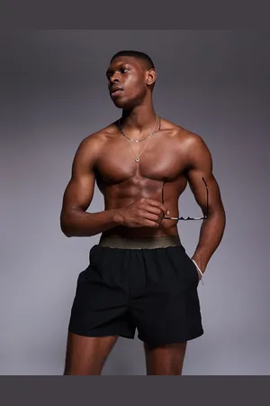 ASOS Swim shorts in short length with elastic waistband detail in