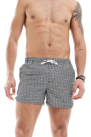 Aray Geo print swim shorts in black and white