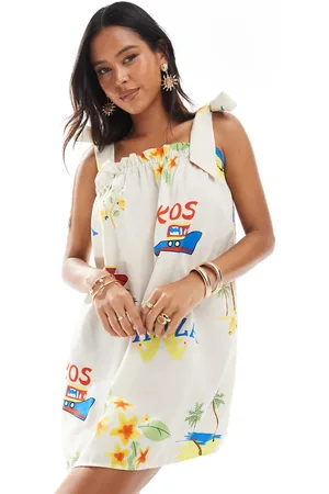 Pieces® Tie shoulder cami smock mini dress in cream based conversational print