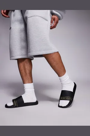 EA7 Armani gold logo beach slides in