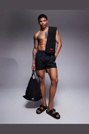 HUGO BOSS Cruise logo towel/swim shorts and bag set in