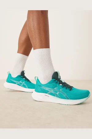 Asics Gel-Pulse 16 running trainers in illuminate mint and wave teal