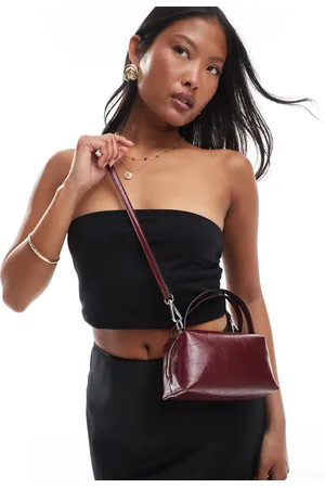 ASOS Textured mini grab clutch with cross body strap in cherry