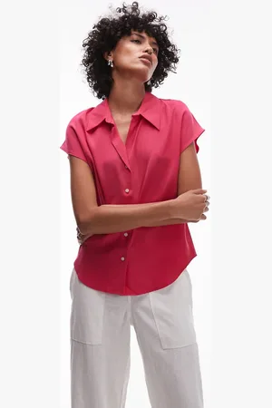 MANGO Classic sleeveless satin shirt with rounded hem in