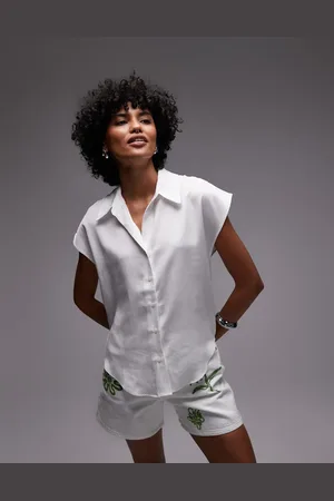 MANGO Classic sleeveless satin shirt with rounded hem in