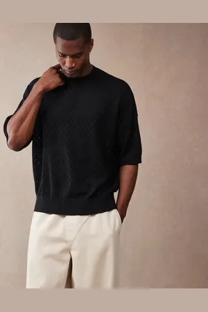 ASOS Oversized fit pointelle knitted t-shirt with argyle pattern in