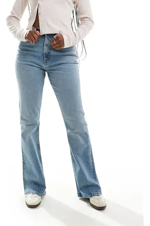 ASOS Mid rise flare jeans in light vintage wash