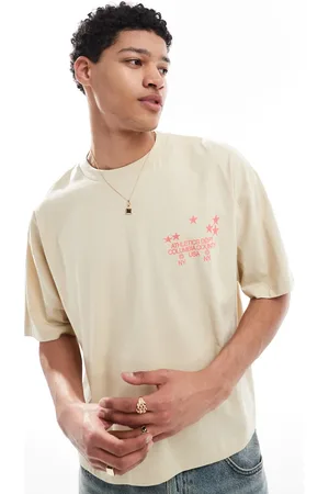 ASOS Boxy oversized t-shirt with sports graphic in beige