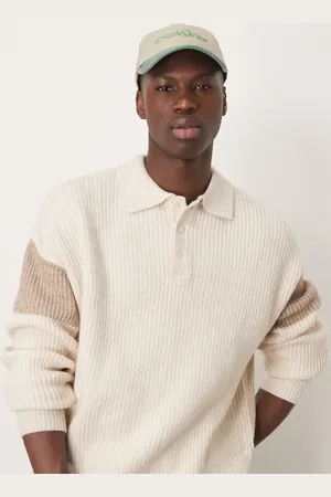 ASOS Relaxed fit ribbed polo jumper in ecru with stone sleeve panel
