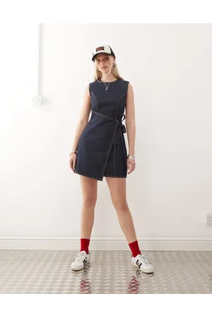COLLUSION Denim mini dress with wrap detail in rinse wash