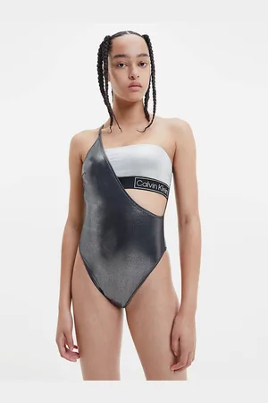 Calvin Klein Bílo-černé dámské metalické jednodílné plavky s průstřihem Calvin Kl - Dámské