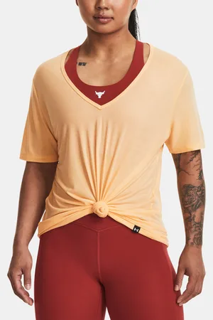 Under Armour Meruňkové dámské sportovní tričko Rock Completer