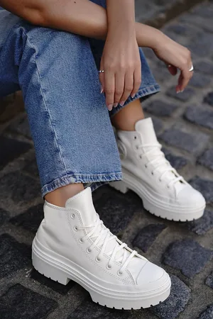 Converse Smetanové kožené kotníkové tenisky na platformě Chuck Taylor All Star Lugged Heel
