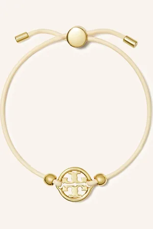 Tory Burch Náramek Silder krémová zlatá