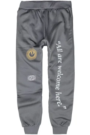 Reebok Plátěné kalhoty z Kalhoty GOOD VIBES