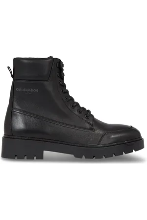 Calvin Klein Turistická obuv Combat Mid Laceup Wl Lth YM0YM00847