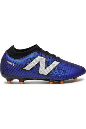 New Balance Boty na fotball Tekela Magique FG V4+ ST3FZ45 Tmavomodrá