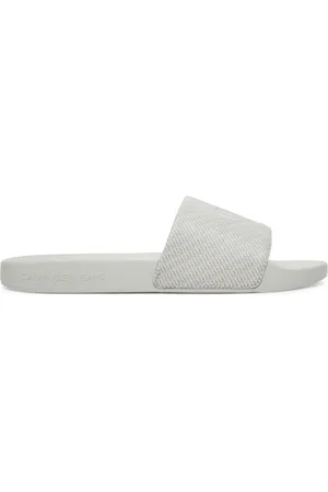 Calvin Klein Nazouváky Slide Aop Print YM0YM01269