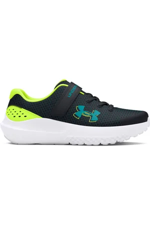Under Armour Chlapecká sportovní obuv (tréninková) UA BPS Surge 4 AC 4 high vis yellow circuit teal