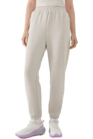 4F Dámské tepláky TROUSERS CAS F1010-83S-BEIGE