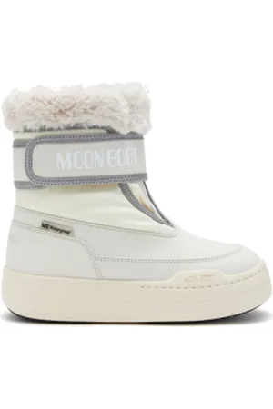 Moon Boot Juniorské vysoké zimní boty MB JR PARK STRAP-JR-L002 CREAM