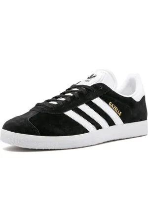 adidas Vycházková obuv Gazelle core black gold met