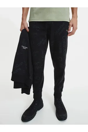 Calvin Klein Černé pánské vzorované tepláky Jeans - Pánské