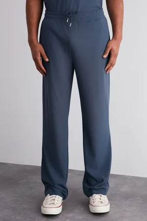 Trendyol Limited Edition Indigo Relaxed/Wide Leg Textured Hidden Lace-Up One Piece Sweatpants