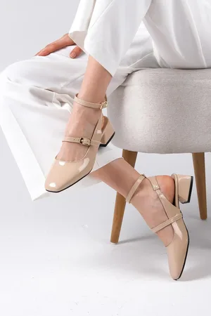 Mio Gusto Audrey Nude Patent Leather Open Back Short Heel Women