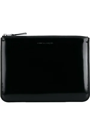 Comme des Garçons Logo-debossed leather clutch bag
