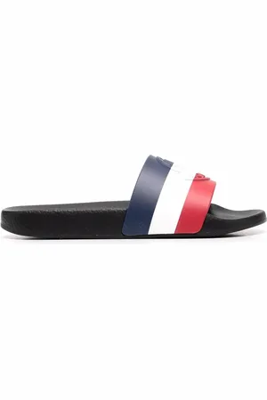 Moncler Embossed-logo striped flip flops