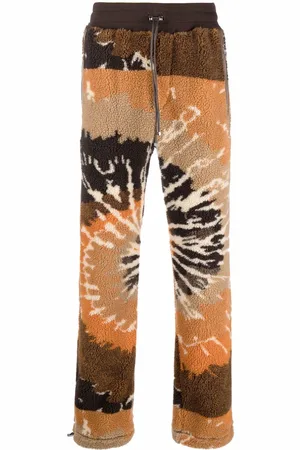 AMIRI Tie-dye faux-shearling trousers